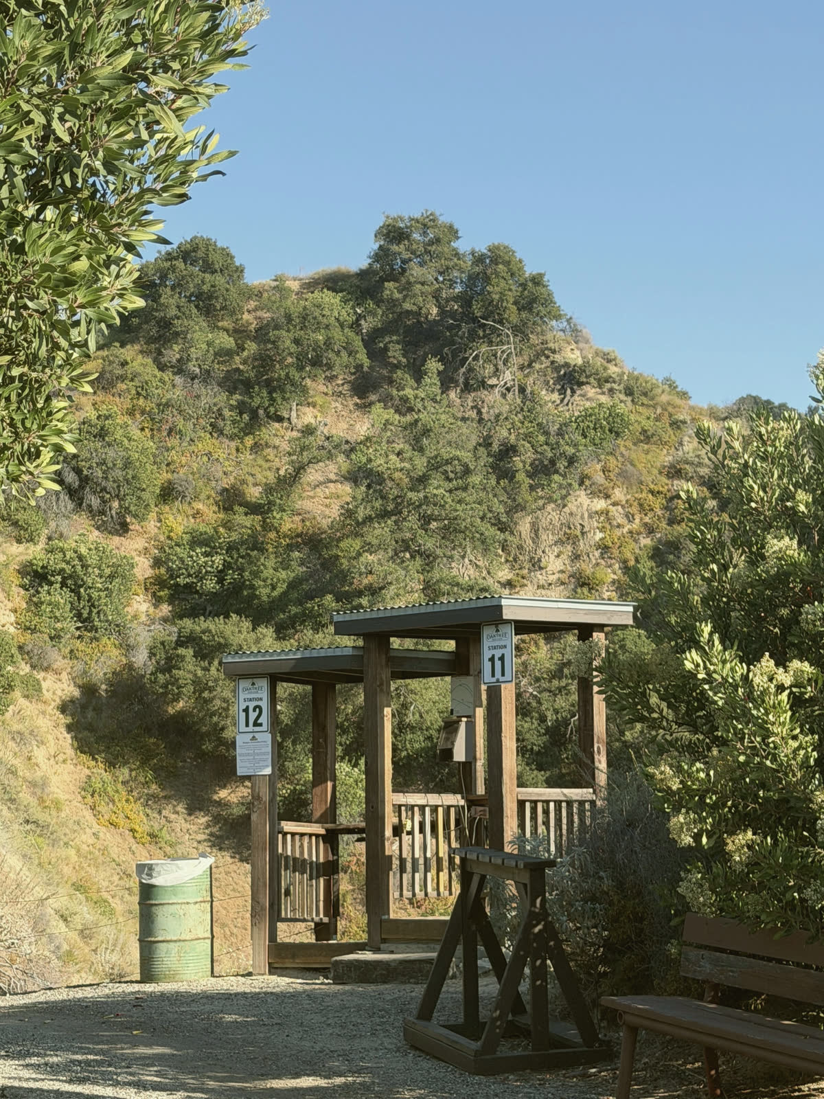 The stands for stations 11 and 12 side by side under the hillside.