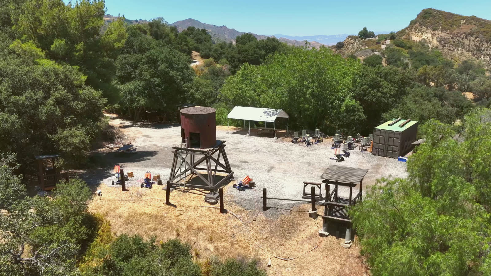 The tower thrower over a field of stands.
