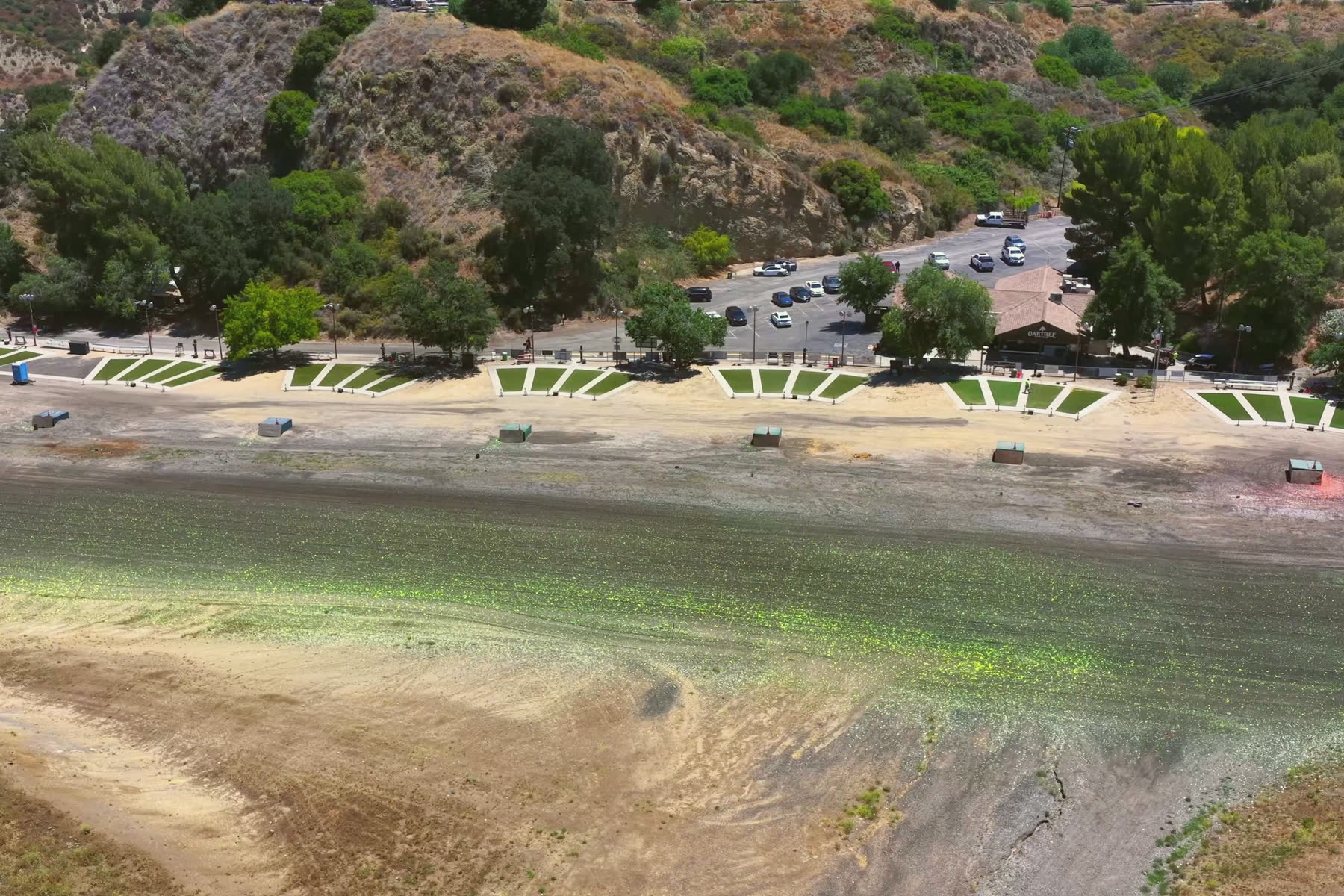 The trap and skeet fields from the air, the parking lot beyond.